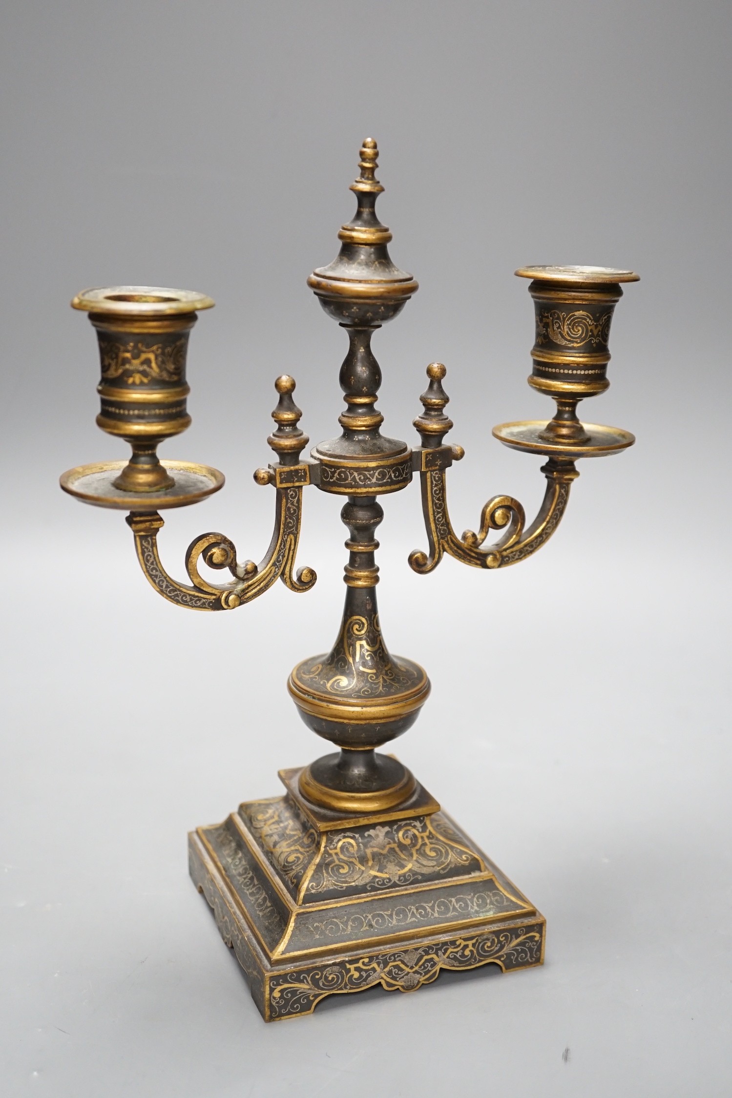A French two branch niello work candelabrum, 16.5cms high